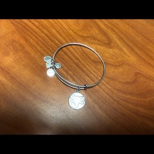 Multiple Alex and Ani bracelets
